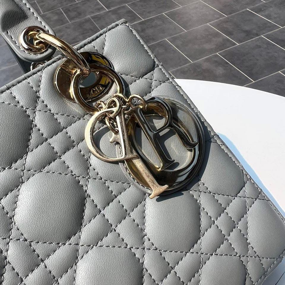 Authentic Dior Gray Small Cannage Lady Dior My ABCDior Grey (Category: Luxury Bags & Wallets) located in Quezon City. Submitted by jhaediah (Listing ID 1374697177, Image 3). Description: Rank A no flaws to excellent Small Champaigne gold Complete inclusion with free pabitbit korea.