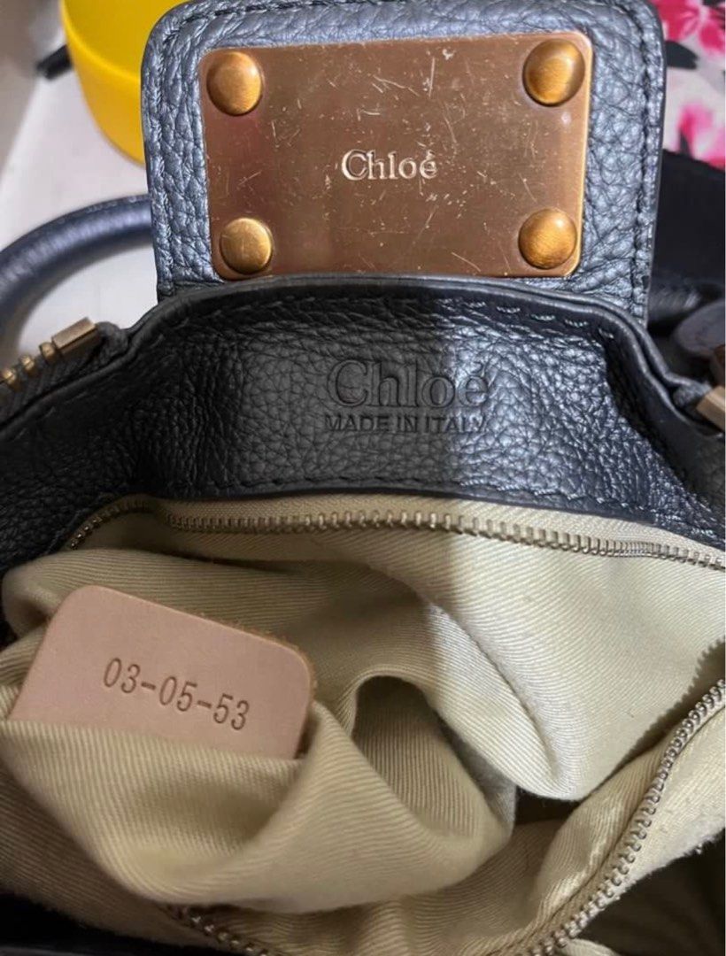 bag (Category: Luxury Bags & Wallets) located in Quezon City. Submitted by yumiizashop (Listing ID 1374723144, Image 3). Description: missing LOCK metallic blue color paddington bag limited edition With crystals on key medium to small size rubs inside lining missing 1 foot hardware tolerable rubs in corners 100% original signs of usage pero maganda pa .
