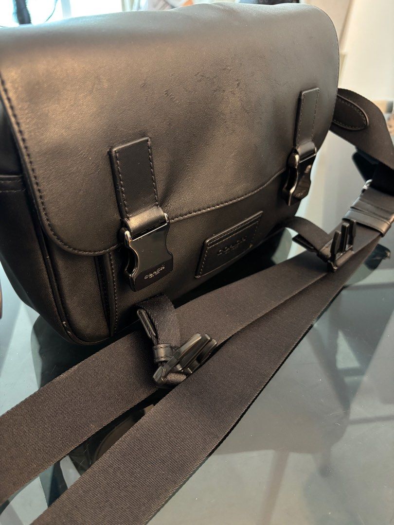 Coach Men cross body sling bag (Category: Bags & Wallets) located in Singapore. Submitted by singaporeanminimart (Listing ID 1374719774, Image 2). Description: Condition 7/10 casually used Comes with bag only (Authentic) Buckle, zip all in good condition Able to put in an IPad Air Big enough to store wallet, phone, keys, charger, iPad, ear piece Not for fussy buyers .