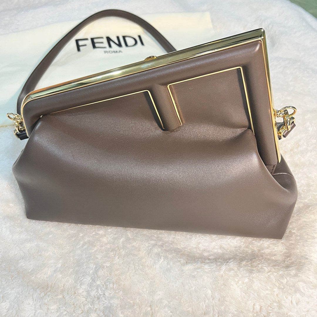 Fendi First (Category: Luxury Bags & Wallets) located in Santa Rosa. Submitted by inirtia (Listing ID 1374851397, Image 1). Description: Fendi First Pochette - Purchased last January 20, 2023 - No flaws, barely used (approximately 2x only) - Dimensions: L - 32.5cm / W - 15cm / H - 23.5cm - Interior hardware cover still intact and not removed - Includes Fendi paperbag, dustbag, box - RFS: barely used, have too many bags Meet-up can be scheduled at