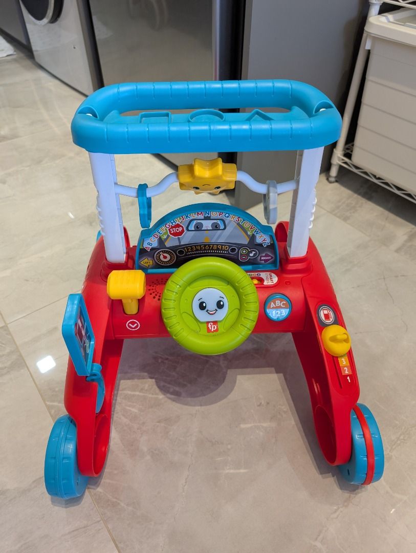 Fisher Price Walker for Baby (Category: Infant Playtime) located in Singapore. Submitted by daqoo (Listing ID 1374850347, Image 1). Description: Seldom use and everything is functional. .