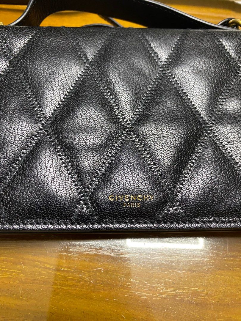 Givenchy GV3 black quilted leather mini bag (Category: Luxury Bags & Wallets) located in Taguig. Submitted by zzarivic (Listing ID 1374795607, Image 2). Description: Quilted leather mini bag detailed with handle, removable and adjustable strap, snap fastening and inner card slots Gcash and BPI payment only As is, where is basis Pick up only when payment has been made Shipping fee is shouldered by the buyer .