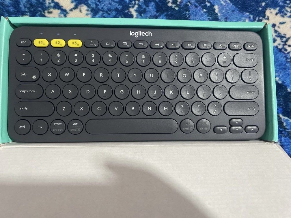 Logitech K380 Bluetooth Keyboard (Category: Computer Keyboard) located in Singapore. Submitted by mamatara (Listing ID 1374798287, Image 3). Description: Never use before Open to check Multiple Device 👍.