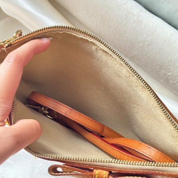 LV Pochette Accessoires Takashi Murakami Limited Edition Red Monogram Cherry Blossom (Category: Bags & Wallets) located in Singapore. Submitted by gracel00 (Listing ID 1374738185, Image 3). Description: Louis Vuitton Pochette Accessories Authentic 100% This bag was purchased from a trusted seller last year, the reason for selling is because it is rarely used so I decided to resell it. Comes with long sling strap and replacement dustbag only Condi