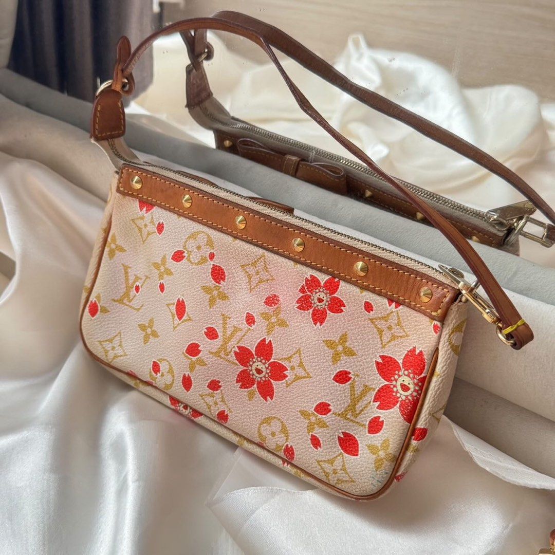 LV Pochette Accessoires Takashi Murakami Limited Edition Red Monogram Cherry Blossom (Category: Bags & Wallets) located in Singapore. Submitted by gracel00 (Listing ID 1374738185, Image 2). Description: Louis Vuitton Pochette Accessories Authentic 100% This bag was purchased from a trusted seller last year, the reason for selling is because it is rarely used so I decided to resell it. Comes with long sling strap and replacement dustbag only Condi