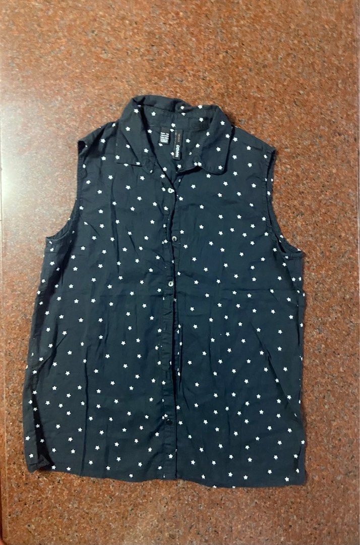Mango polkadots sleeveless polo (Category: Sleeveless) located in Mandaluyong City. Submitted by 1b8e5e9bb9e403bbf2c07471c071cc (Listing ID 1374856836, Image 1). Description: Mango polkadots sleeveless polo slightly used selling at a price of p150 plus shipping fee.