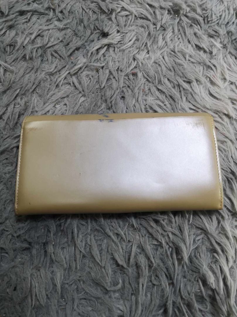 Metallic Beige Long Wallet (Category: Wallets & Card holders) located in Santa Cruz. Submitted by jmy_surplus.2 (Listing ID 1374759526, Image 2). Description: Size ; L - 4.4 W - 7.5 Color ; Beige Type ; Long Wallet Brand ; No brand Material ; Leather Style ; Snap Closure Long Wallet LG 111 JMY 1.