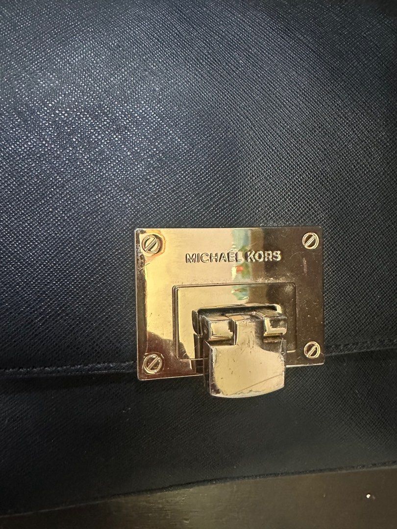 Michael Kors small leather handbag (Category: Bags & Wallets) located in Singapore. Submitted by checkmate8 (Listing ID 1374721678, Image 2). Description: A light durable full leather bag with chain shoulder strap. Clearing for space at home . Super sale at $80.