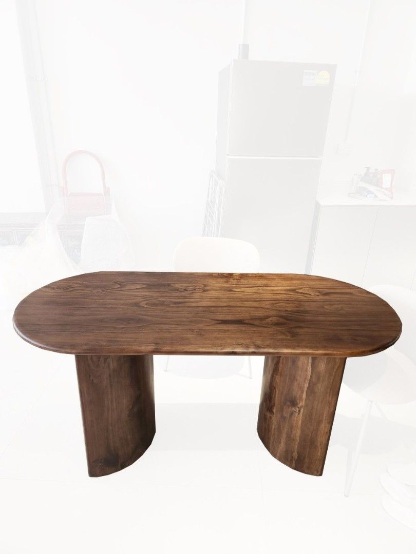Solid Wood Table (Category: Tables & Sets) located in Singapore. Submitted by nyk0737 (Listing ID 1374756593, Image 2). Description: solid wood table in dark ash brown walnut colour.