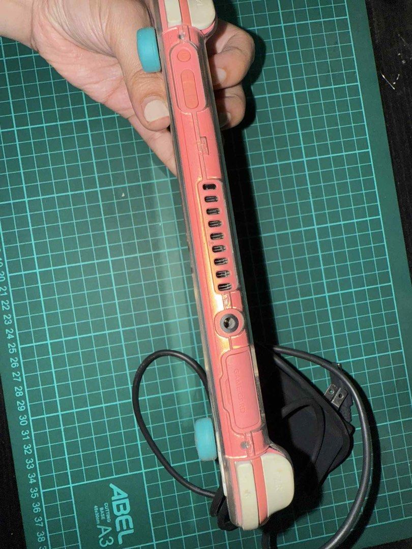 Switch lite pink (Category: Nintendo) located in Quezon City. Submitted by rinahdg (Listing ID 1374743108, Image 2). Description: Barely used Good as brand new With clear case and green protective button With original charger Negotiable.