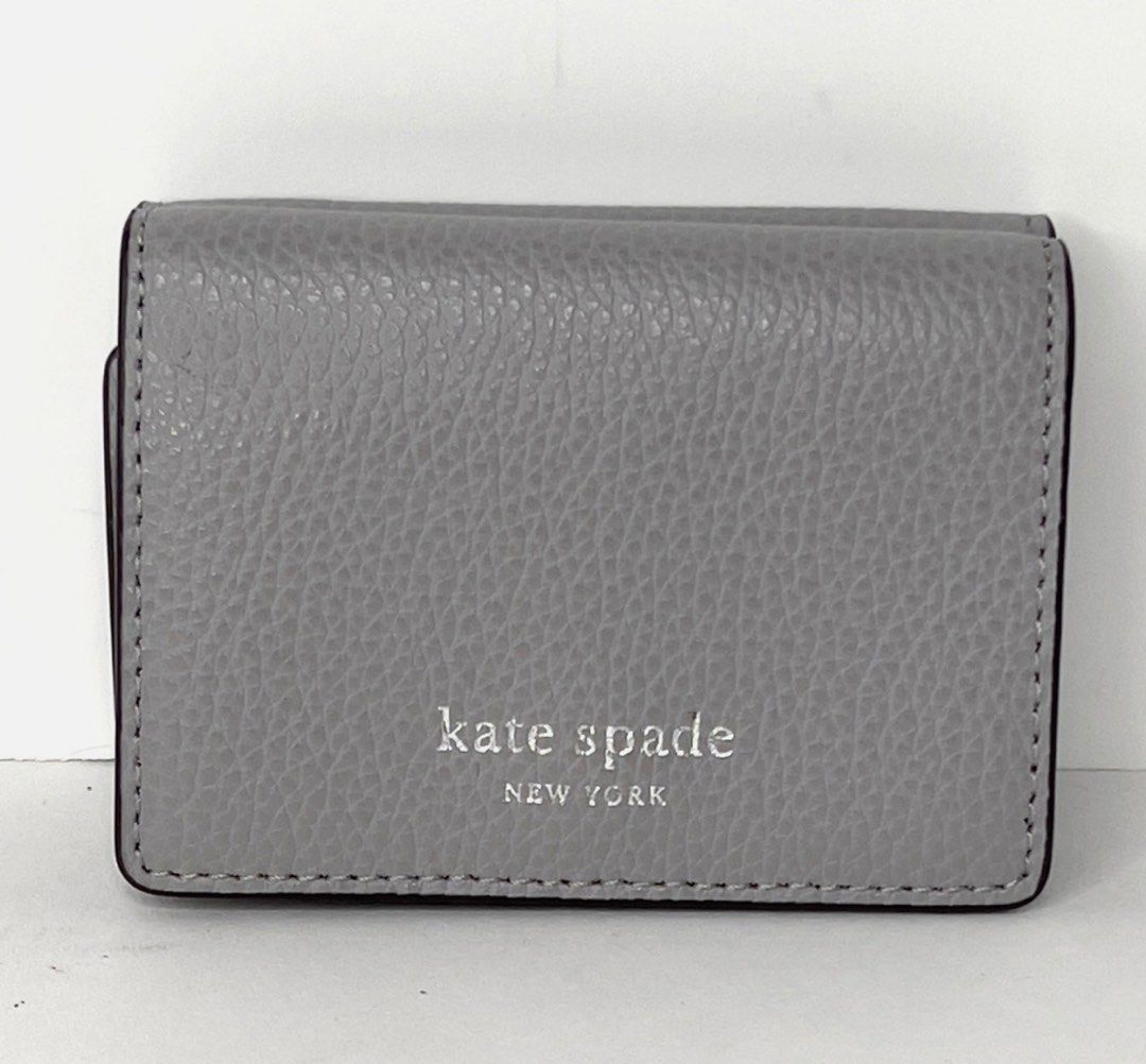 AUTHENTIC/ORIGINAL KateSpade Staci Micro Tri Fold Small Grey Wallet (Category: Luxury Bags & Wallets) located in Pasig City. Submitted by 3dsbagcollectionbydiane (Listing ID 1374909863, Image 1). Description: used once lang. can pass as brandnew Wala na paperbag and tag Bought in US pasabay PM for more details.