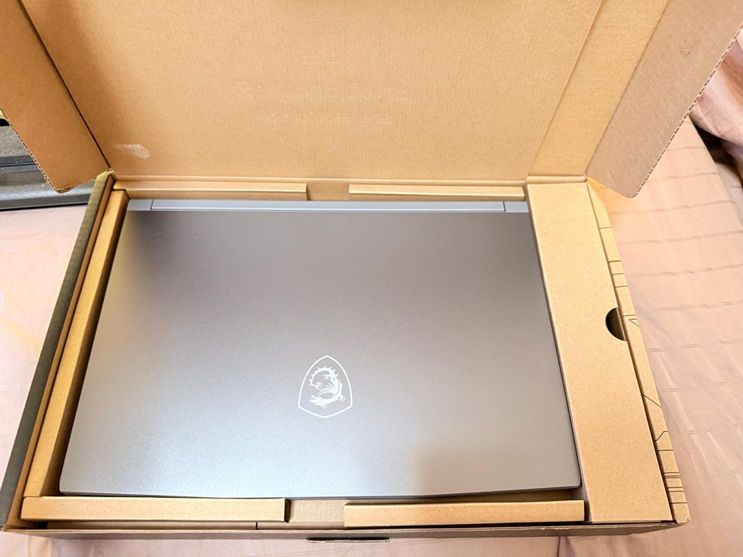 BRAND NEW! ✨MSI Gaming Laptop (Category: Laptops & Notebooks) located in Singapore. Submitted by shoppebypaj (Listing ID 1374988768, Image 2). Description: Brand New MSI Gaming Laptop – Cosmos Gray 💻 15inch, Intel Core i5 Processor ⚡ 16GB DDR4 RAM | 512GB SSD 🎮 Ideal for gaming, school, or work 🖱️ Cosmos Gray finish – sleek & stylish ✅ Still in box, never used. Bought this month only. 🎁 Free laptop bag included! Best deal for a brand new unit