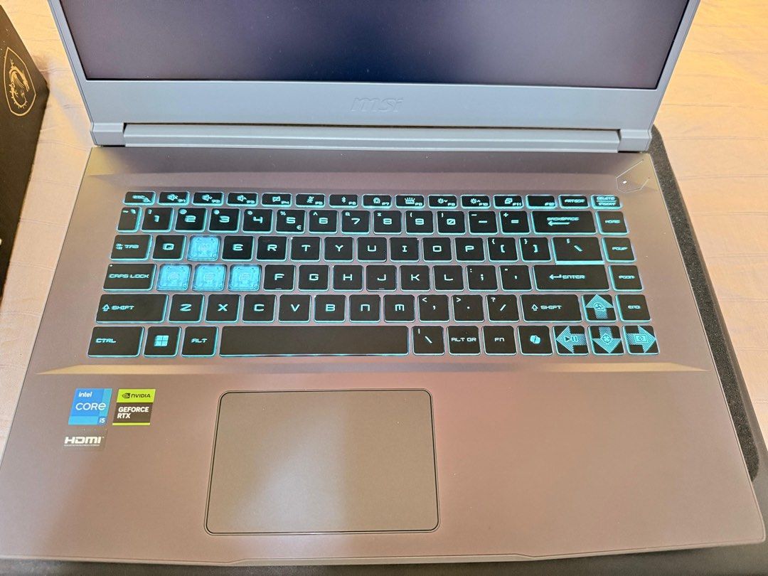BRAND NEW! ✨MSI Gaming Laptop (Category: Laptops & Notebooks) located in Singapore. Submitted by shoppebypaj (Listing ID 1374988768, Image 3). Description: Brand New MSI Gaming Laptop – Cosmos Gray 💻 15inch, Intel Core i5 Processor ⚡ 16GB DDR4 RAM | 512GB SSD 🎮 Ideal for gaming, school, or work 🖱️ Cosmos Gray finish – sleek & stylish ✅ Still in box, never used. Bought this month only. 🎁 Free laptop bag included! Best deal for a brand new unit