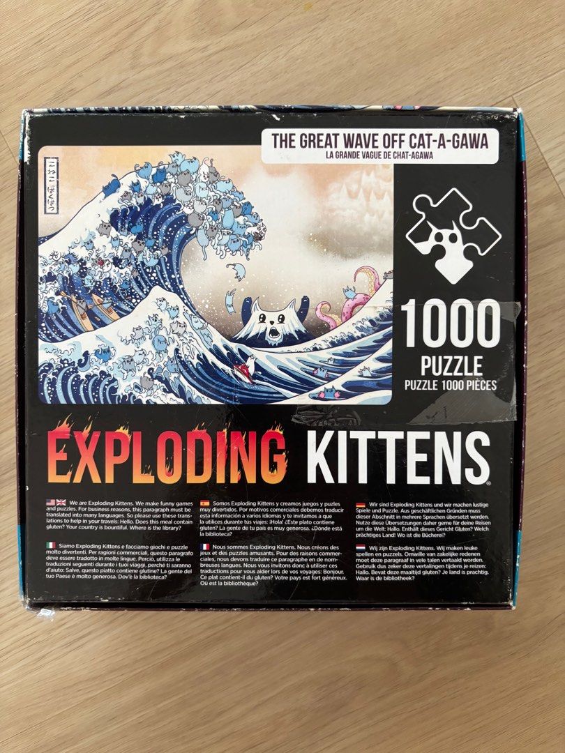 Exploding kitten puzzle (Category: Board Games & Puzzles) located in Singapore. Submitted by __t__ (Listing ID 1374985340, Image 2). Description: No missing pieces Box is slightly damaged as shown in photos but puzzle itself has no defect Nego for fast deals.