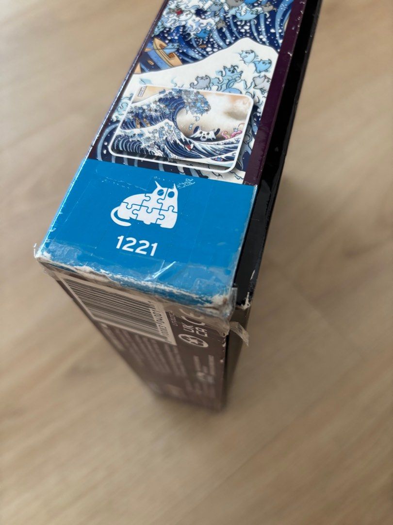 Exploding kitten puzzle (Category: Board Games & Puzzles) located in Singapore. Submitted by __t__ (Listing ID 1374985340, Image 5). Description: No missing pieces Box is slightly damaged as shown in photos but puzzle itself has no defect Nego for fast deals.