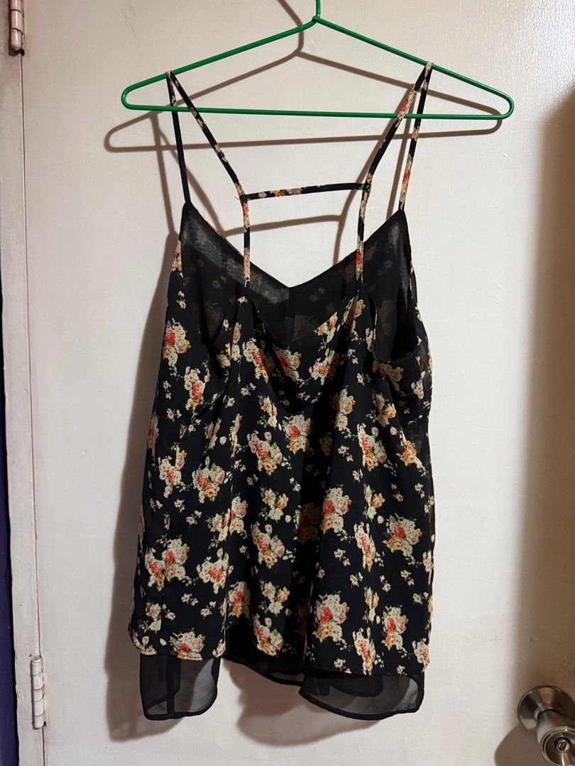 Forever 21 Black Floral Top (Category: Sleeveless) located in Marikina City. Submitted by declutteringera (Listing ID 1375034776, Image 2). Description: - size S (fits small to semi-large since it's loose) - in excellent condition; used only twice RFS: decluttering.