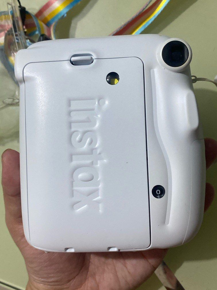 Battery Issue - Fujifilm Instax Mini 11 White (Category: Cameras) located in Manila. Submitted by doooough (Listing ID 1375001992, Image 2). Description: - seldom used - battery issues, need to repair - comes with strap - batteries excluded .