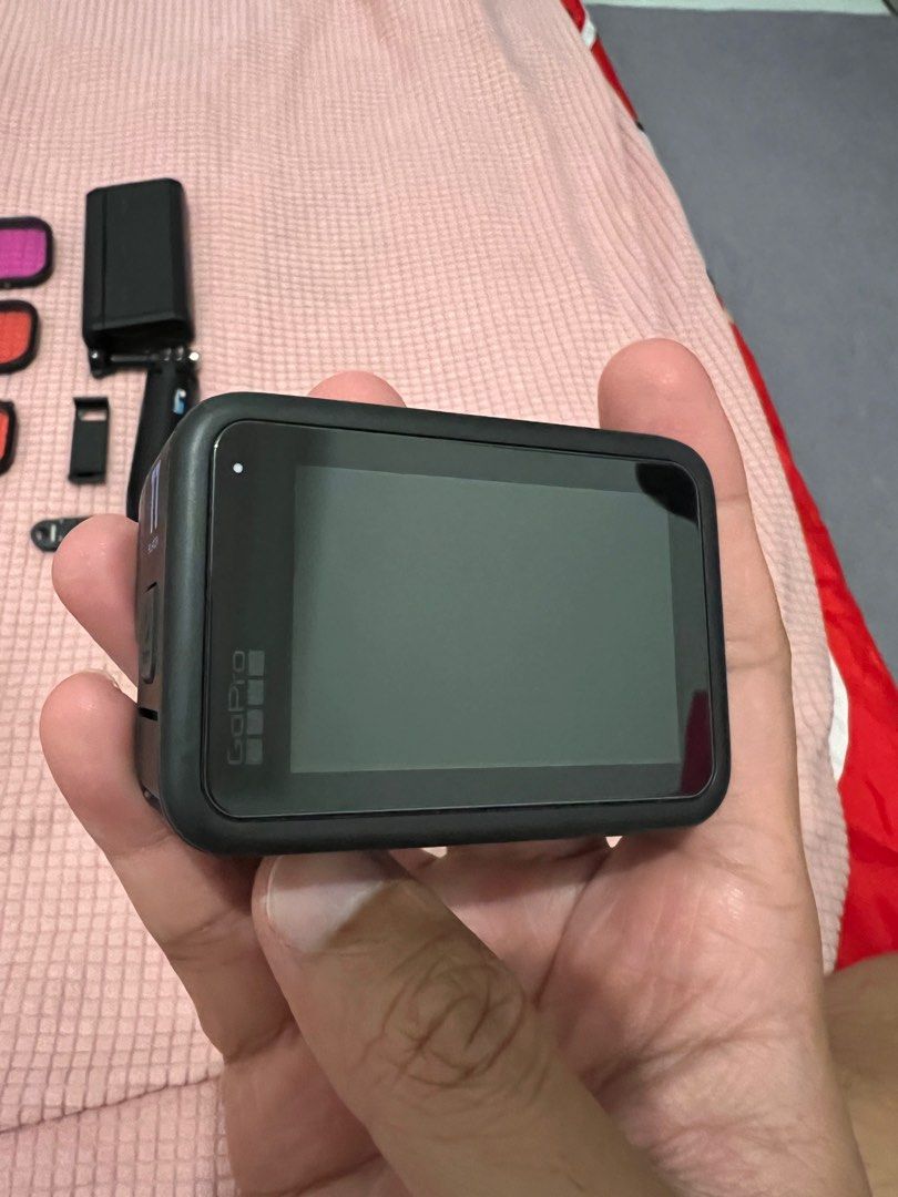 GoPro Hero 11 + accessories (Category: Cameras) located in Cavite. Submitted by robinsparkles8719 (Listing ID 1375032051, Image 3). Description: Lightly used GoPro Hero 11. Light dent on the camera cover but it is replaceable. Included items are - GoPro Hero 11 Black - GoPro Enduro Battery x2 - GoPro Shorty -GoPro hard shell case - Telesin battery pack charger - Telesin ND Filters x4 - Telesin Dive Case - Telesin Dive filters - Telesin quick moun