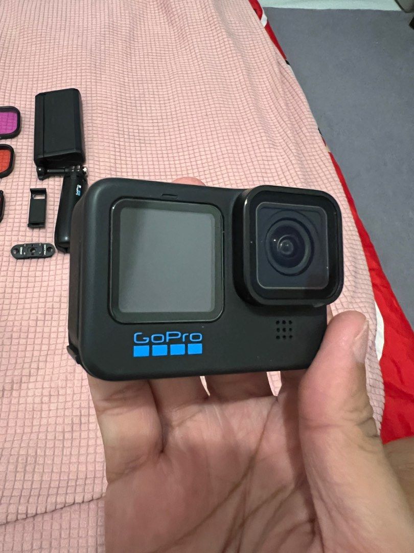 GoPro Hero 11 + accessories (Category: Cameras) located in Cavite. Submitted by robinsparkles8719 (Listing ID 1375032051, Image 2). Description: Lightly used GoPro Hero 11. Light dent on the camera cover but it is replaceable. Included items are - GoPro Hero 11 Black - GoPro Enduro Battery x2 - GoPro Shorty -GoPro hard shell case - Telesin battery pack charger - Telesin ND Filters x4 - Telesin Dive Case - Telesin Dive filters - Telesin quick moun