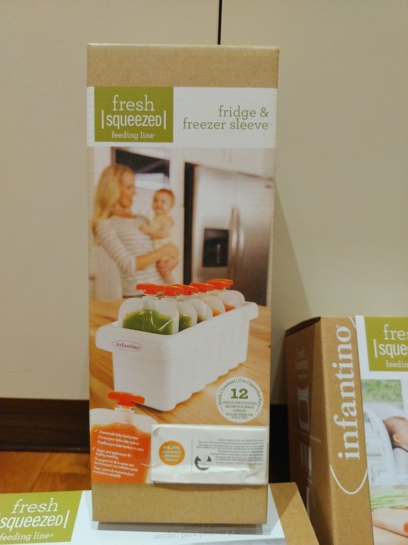 Infantino Fresh Squeezed Squeeze Station, Reusable squeeze pouch, fridge & freezer sleeve (Category: Weaning & Toddler Feeding) located in Singapore. Submitted by purpurw (Listing ID 1375050051, Image 3). Description: Make your own healthy purees and store them easily. Perfect for preparing baby food. Infantino Fresh Squeezed Squeeze Station, includes 10 single use pouches - Qty avail 2 - $30 each Infantino reusable squeeze pouches - Qty avail 1 