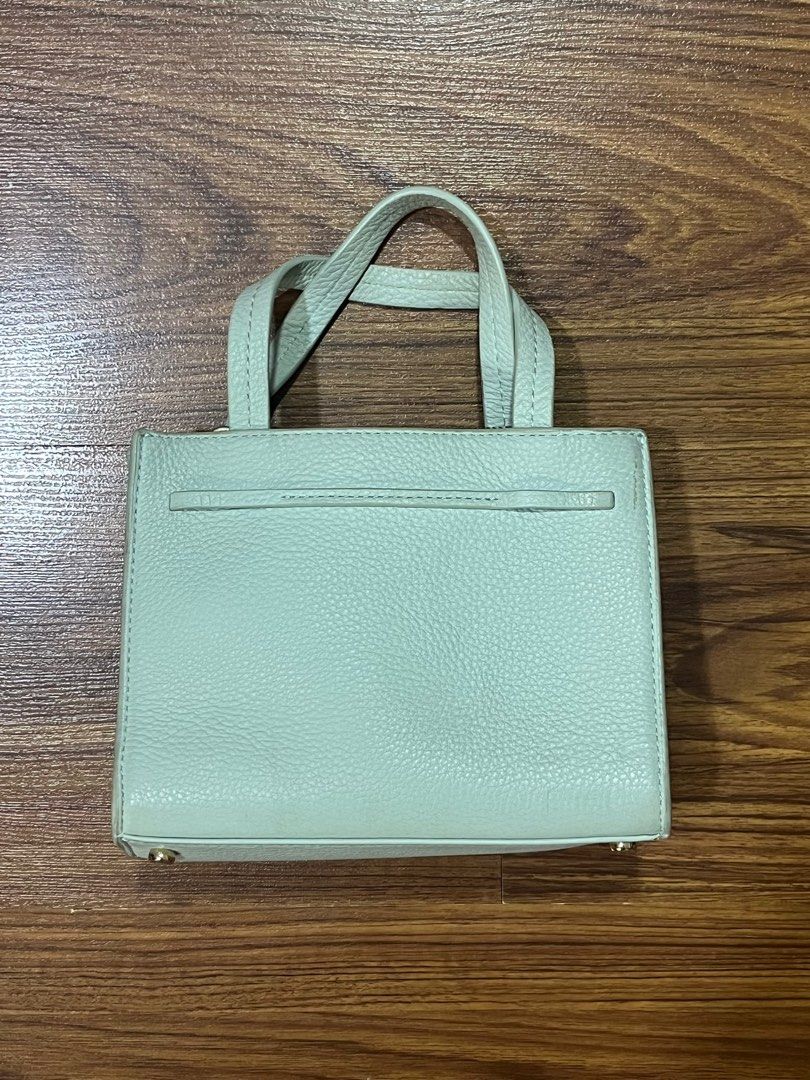 kate spade mint hayes leather satchel (Category: Luxury Bags & Wallets) located in Paranaque City. Submitted by bunny_bumji (Listing ID 1375055982, Image 2). Description: loved this bag but unfortunately stopped using it once i got into college :(( some minor flaws + needs cleaning! such a pretty mini color though… very cutesy very demure 😆.