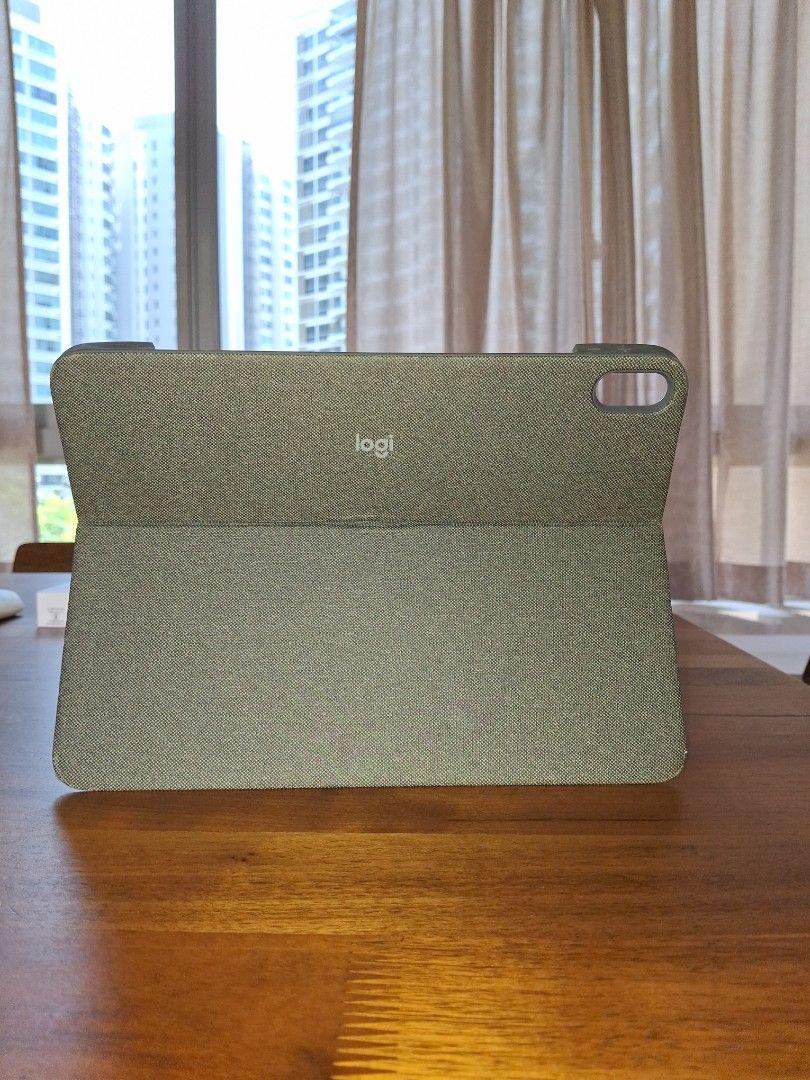 Logitech Combo Touch Keyboard for iPad Air 11 and 13 (Category: Computer Keyboard) located in Singapore. Submitted by ms_meyer.road (Listing ID 1374932079, Image 3). Description: - Logitech Combo Touch keyboard for iPad Air. Has built in Touch pad. - Refer photo posted to check compatible with which all iPad models Very good condition - Lightly used - Includes original box - Purchased from Apple Store for $289 - Perfect for typing on the go.