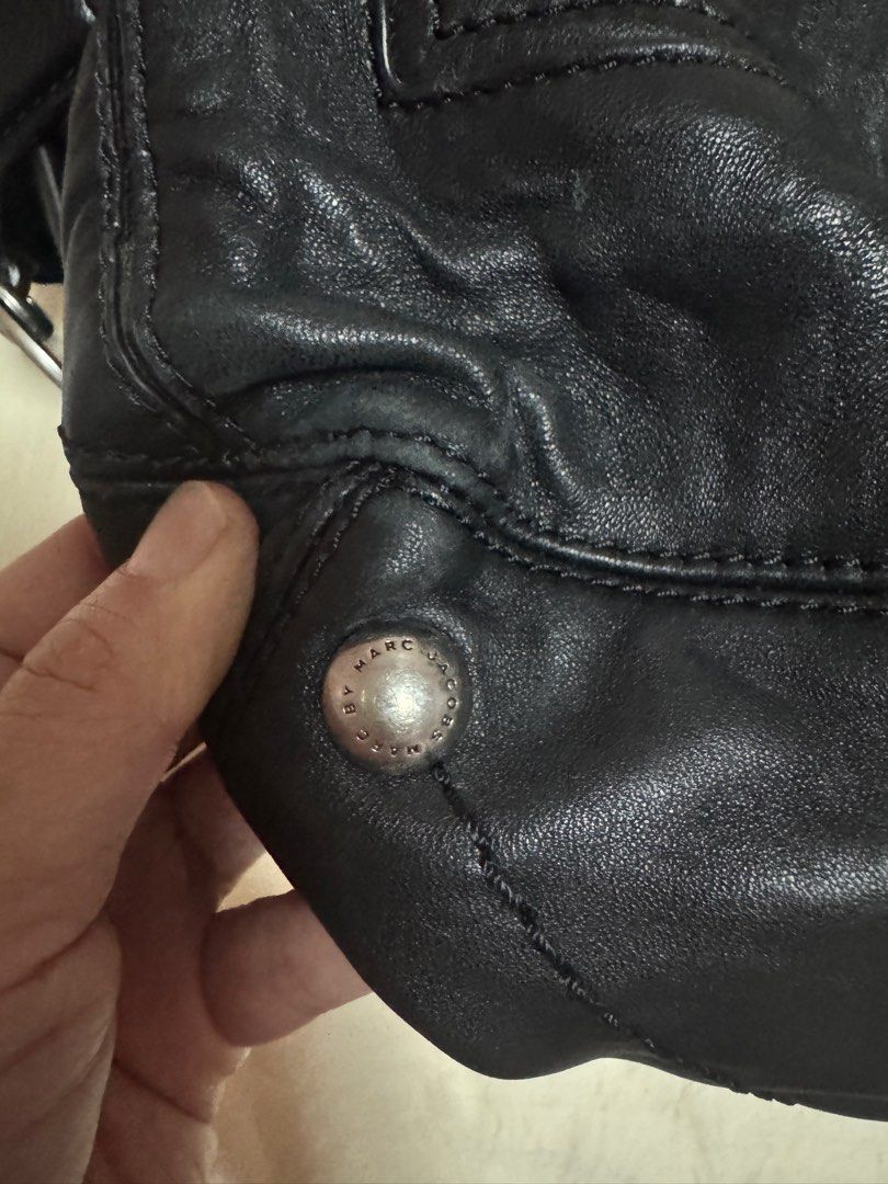 Authentic Marc by Marc Jacobs (Category: Luxury Bags & Wallets) located in Quezon City. Submitted by harristhegoldenboy (Listing ID 1375004609, Image 3). Description: Marc by Marc Jacobs bag standard supply workwear bag In really excellent condition. Last few pics when worn Inclusion - dustbag. Price negotiable RFS decluttering .