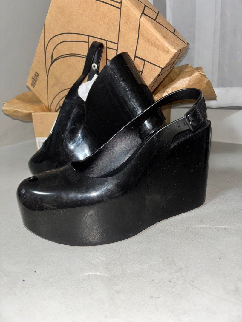 MELISSA Groovy Wedge Size 10 (Category: Wedges) located in Pasig City. Submitted by decluttermaven (Listing ID 1375031402, Image 2). Description: AVAILABLE while still posted. Selling MELISSA Groovy Wedge in Black Size 10 Wedge height = 5 inches With original box Worn twice for an event Minimal scratches on soles and sides but barely noticeable in real life (the flash makes the fingerprints look ultra visible in the photos) Orig price: Php 5200 (
