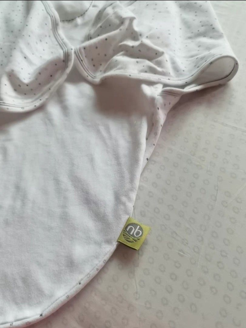 Nested Beans Zen Swaddle newborn (Category: Babies & Kids Fashion) located in Singapore. Submitted by flyingcoolfish (Listing ID 1374891933, Image 2). Description: 9/10 condition as shown in pics, selling as we have other swaddles and wish to clear some space. can be used from 0-6 months.