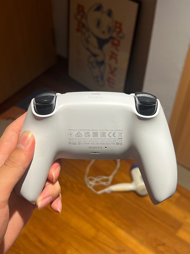 PS5 Controller (Category: Controllers) located in Singapore. Submitted by veryredboy (Listing ID 1375039922, Image 2). Description: Barely used, perfect condition. Selling because no more time to play because of school..