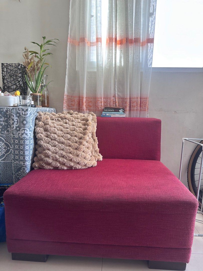 Red sofa/ couch (Category: Sofas) located in Makati City. Submitted by wellovedthrift (Listing ID 1374963021, Image 1). Description: Sofa in very good condition with 2 throw pillows for free RFS: need smaller sofa sa bagong nilipatan.