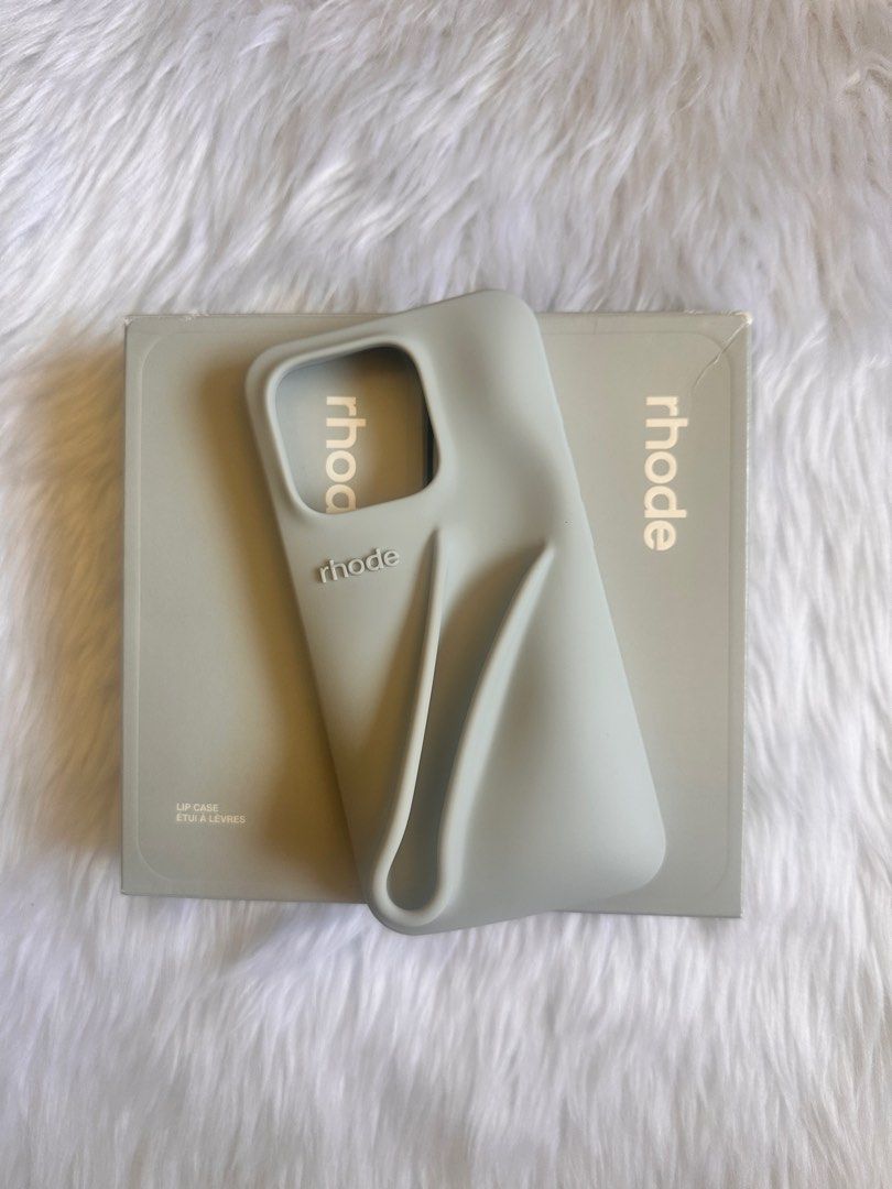 Rhode iPhone 15 Pro Lip Case (Category: Makeup) located in Cebu City. Submitted by twixbabyy (Listing ID 1374900703, Image 1). Description: 2 pcs available onhand! Bought directly from the Rhode website :) ❕Does not come with the lip tint! ✿ Check out our instagram @thecrakeclub for more makeup products 💗.
