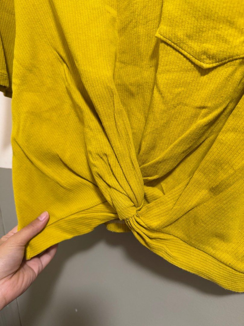 S-M Mustard Yellow Crop Top (Category: Shirts) located in Manila. Submitted by mjcdeclutters (Listing ID 1375023592, Image 3). Description: Tie is built-in Cropped Medyo heavy fabric Fabric is stretchy Fits S-M More mustard than bright yellow Payment via GCash/Bank transfer Shipping c/o Buyer Preferred for buyer to book the courier so you can choose and track easily. Easy kausap, message anytime. ✨.