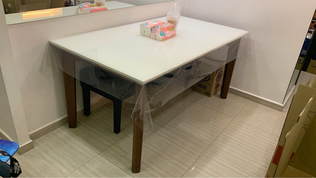 Solid dining table perfect condition (Category: Tables & Sets) located in Singapore. Submitted by thexgeneral (Listing ID 1375016668, Image 1). Description: Almost like new dining table. Can fit 6 chairs. 90cm by 160cm Purchase at $1200 letting go at $600(exclude delivery) .