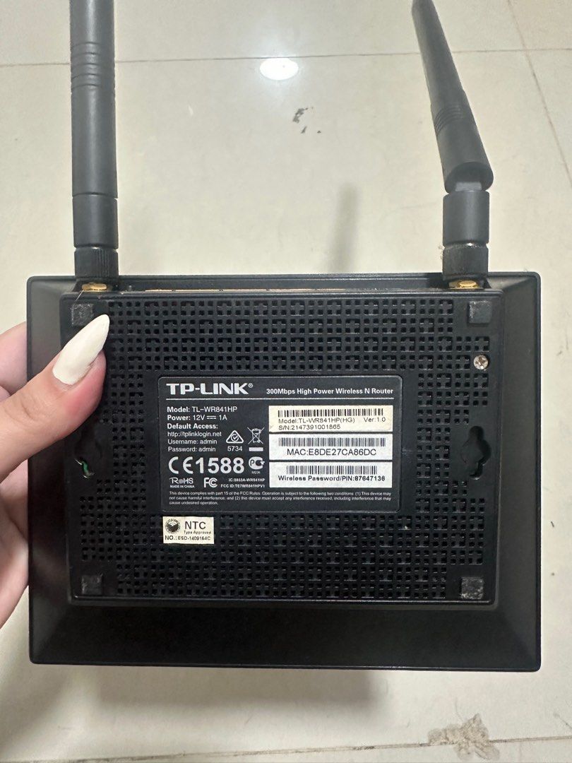 Tp-Link Router (Category: Networking) located in Pasig City. Submitted by declutterisreal (Listing ID 1375018542, Image 3). Description: with adaptors.