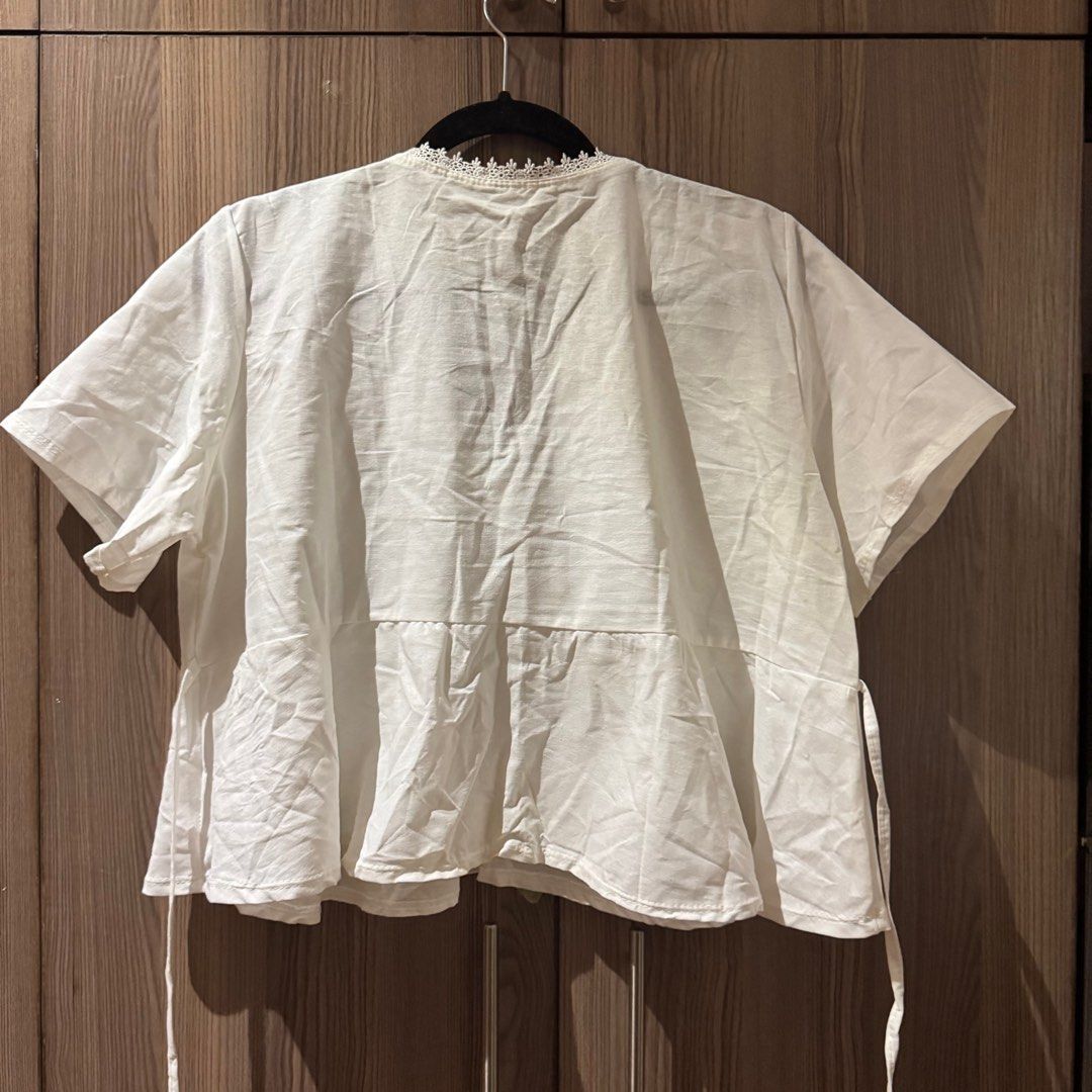 White blouse from Polin PH (Category: Blouses) located in Cainta. Submitted by chartxn (Listing ID 1374923205, Image 2). Description: brand new bought from tiktok shop. no tag. rfs: wrong size mop: gcash or maya mod: sdd or ggx.