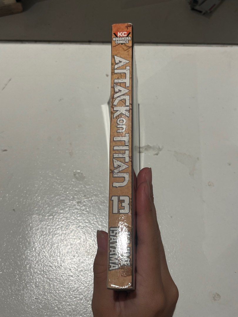 ATTACK ON TITAN VOLUME 13 MANGA BOOK (Category: Comics & Manga) located in Taguig. Submitted by maxi_e (Listing ID 1375238275, Image 2). Description: RFS: Don’t read manga anymore. -barely used/read, good condition - bought in fully booked - buyer will cover SF - willing to negotiate price :).