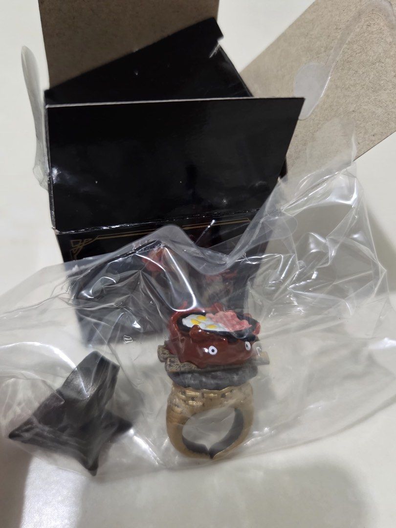Authentic calcifier ring (Category: Vintage Collectibles) located in Singapore. Submitted by xbdian26 (Listing ID 1375240639, Image 2). Description: Selling because bought 2 blind box and got the same design. .