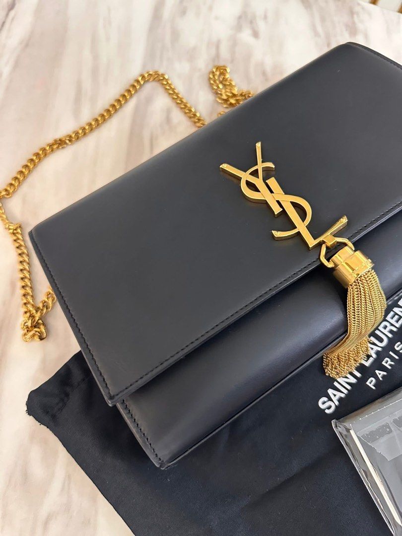 Authentic YSL Kate Medium with tassel (Category: Luxury Bags & Wallets) located in Quezon City. Submitted by jhaediah (Listing ID 1375234171, Image 2). Description: Medium gold kate with tassel With cards and dustbag Good condition Free pabitbit Korea.