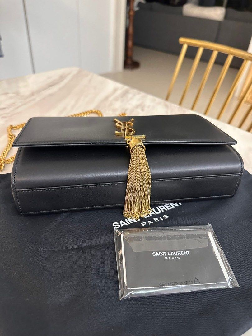 Authentic YSL Kate Medium with tassel (Category: Luxury Bags & Wallets) located in Quezon City. Submitted by jhaediah (Listing ID 1375234171, Image 3). Description: Medium gold kate with tassel With cards and dustbag Good condition Free pabitbit Korea.