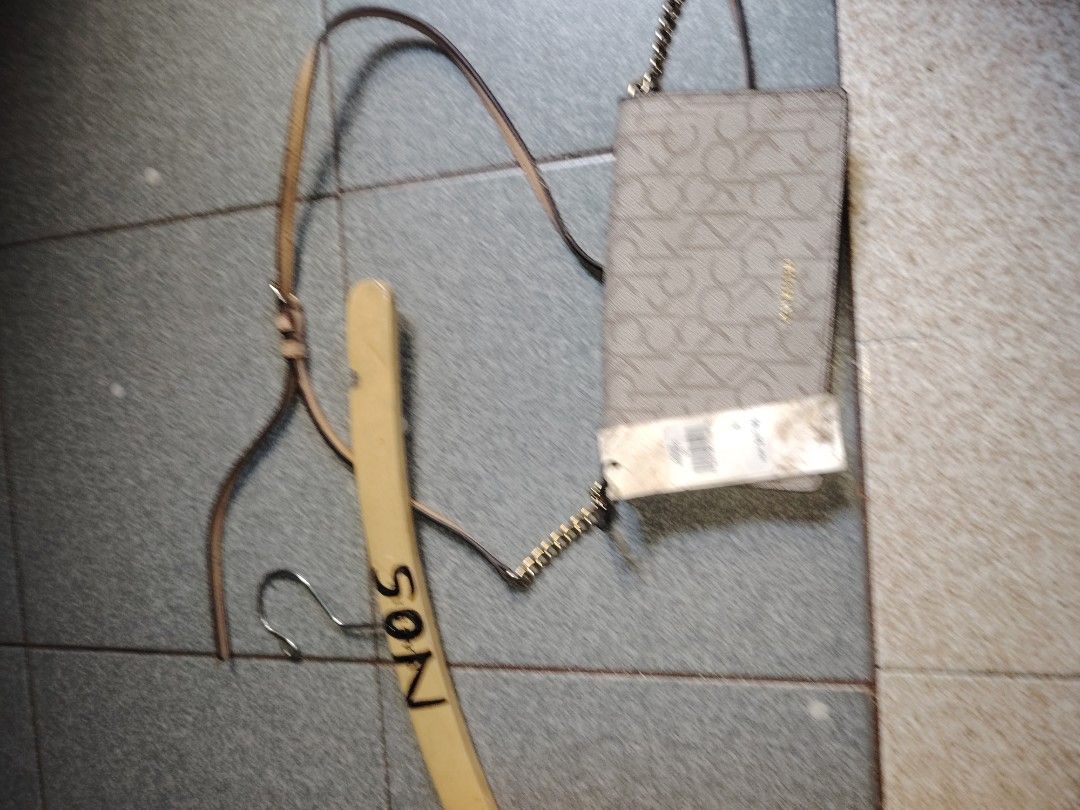 CALVIN KLEIN (Category: Luxury Bags & Wallets) located in Pasig City. Submitted by michelle.asuki (Listing ID 1375118884, Image 1). Description: CALVIN KLEIN CROSS BODY BAG BNEW WITH TAG 1500 DM DM DM DM.