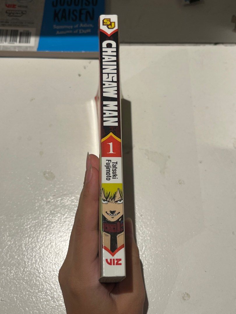 CHAINSAW MAN VOLUME 1 MANGA BOOK (Category: Comics & Manga) located in Taguig. Submitted by maxi_e (Listing ID 1375238448, Image 2). Description: RFS: Don’t read manga anymore. -barely used/read, good condition - bought in fully booked - buyer will cover SF - willing to negotiate price :).