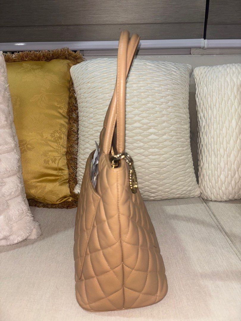 Chanel Medallion Beige (Category: Luxury Bags & Wallets) located in Quezon City. Submitted by icequizon (Listing ID 1375228054, Image 3). Description: 100% authentic Excellent condition No inclusions Bag only! Beige color Holo sticker still attached Slightly negotiable .