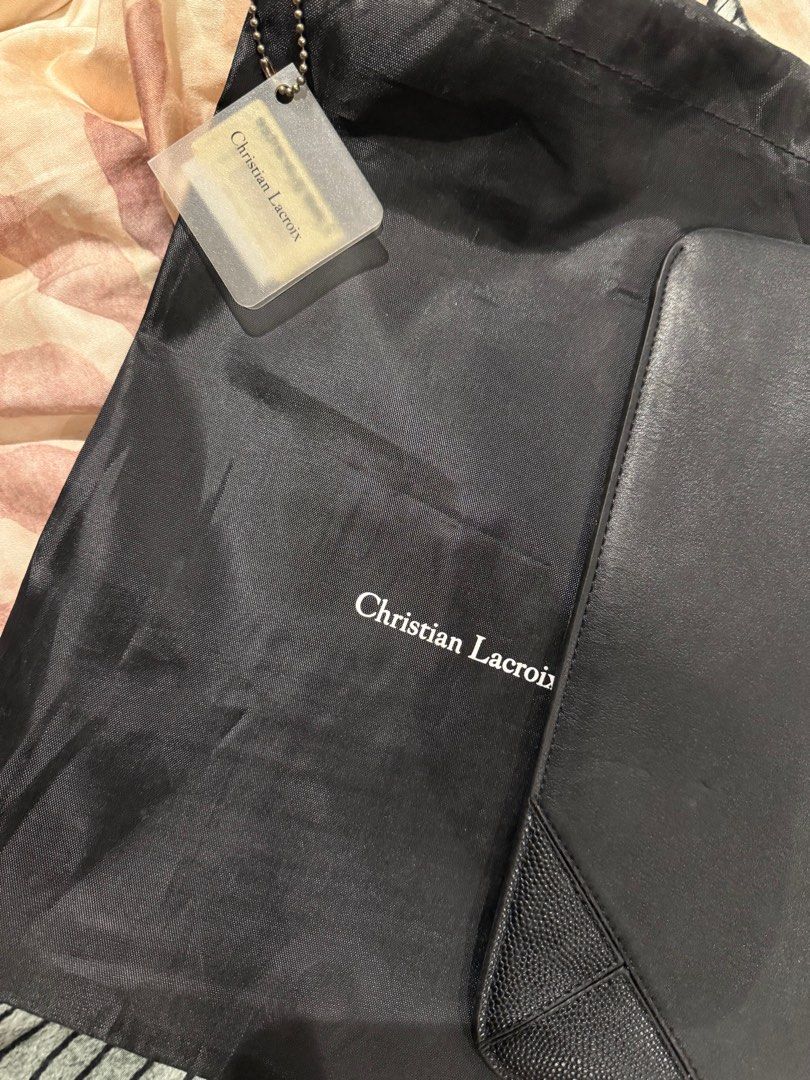 Christian Lacroix iPad Pouch (Category: Luxury Bags & Wallets) located in Cainta. Submitted by fashion_hunter (Listing ID 1375253832, Image 3). Description: Christian Lacroix iPad Pouch / Cover. Unused from UK. Worth 89 EUR / 5,800 PHP.