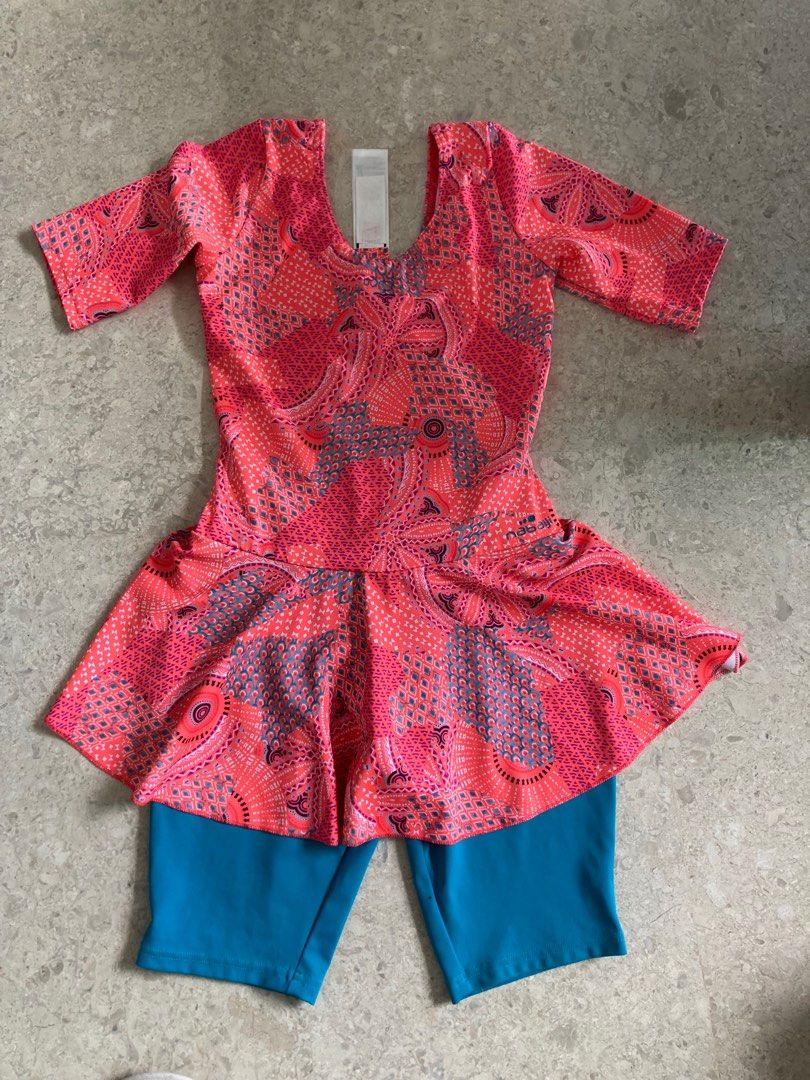 Girls swimsuit with attached pants (Category: Babies & Kids Fashion) located in Singapore. Submitted by jeankohsc (Listing ID 1375132804, Image 1). Description: Brand - Nabaiji from Decathlon.