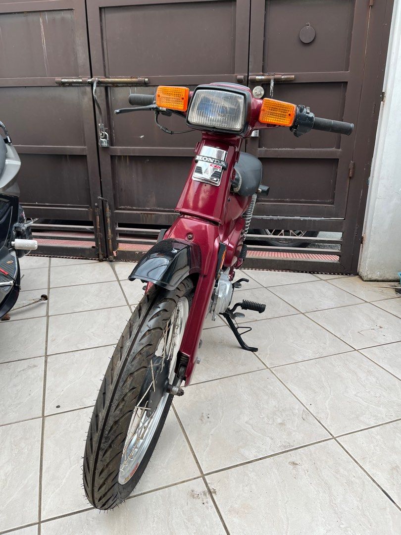 Honda C70 1997 (Category: Other Motorcycles Parts and Accessories) located in Las Pinas. Submitted by franzkenzo (Listing ID 1375208522, Image 1). Description: For Sale AS IS Honda C70 1997 Running condition 70cc Complete papers Last register 2011 2022 tire production quick tires New aluminum rim Complete wire harness Issue no dos and lights and switches Dm me for more info Las Piñas City .