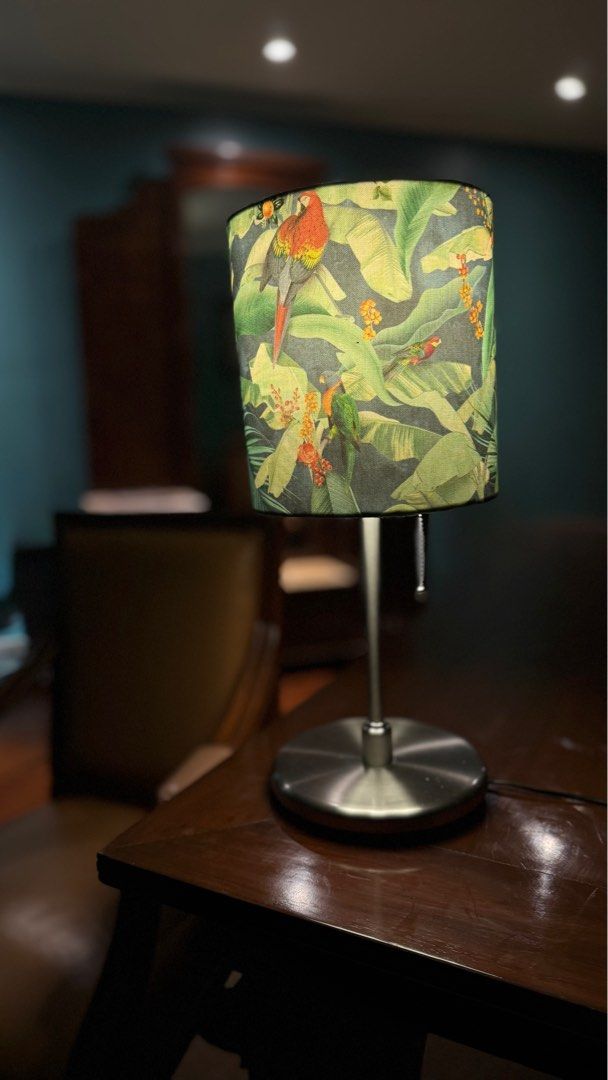 Ikea Lamp with Happy Light MNL Shade (Category: Lighting) located in Makati City. Submitted by cruisegold (Listing ID 1375271043, Image 1). Description: Ikea Skaftet lamp base with Happy Light MNL shade Seldom used, placed on office desk, but lighting in office is appropriate already for work. Shipping will be from Makati.