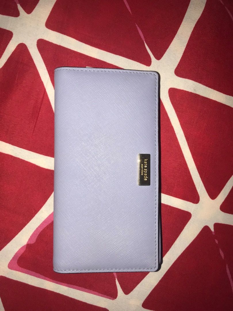 Kate Spade Stacy Bifold Wallet WLRU1601 (Category: Luxury Bags & Wallets) located in General Trias. Submitted by karinator (Listing ID 1375180976, Image 1). Description: ORIGINAL Kate Spade Newbury Lane Stacy Bifold Wallet WLRU1601 [Lilac-Coloured]. Bought for 138 CAD = PHP 5,300. Slightly used, only needs cleaning. RFS: Not my style e 😅 Nakatambak lang sa bahay. You can send me a message if you want more pictures. Price a bit negotiable for sur