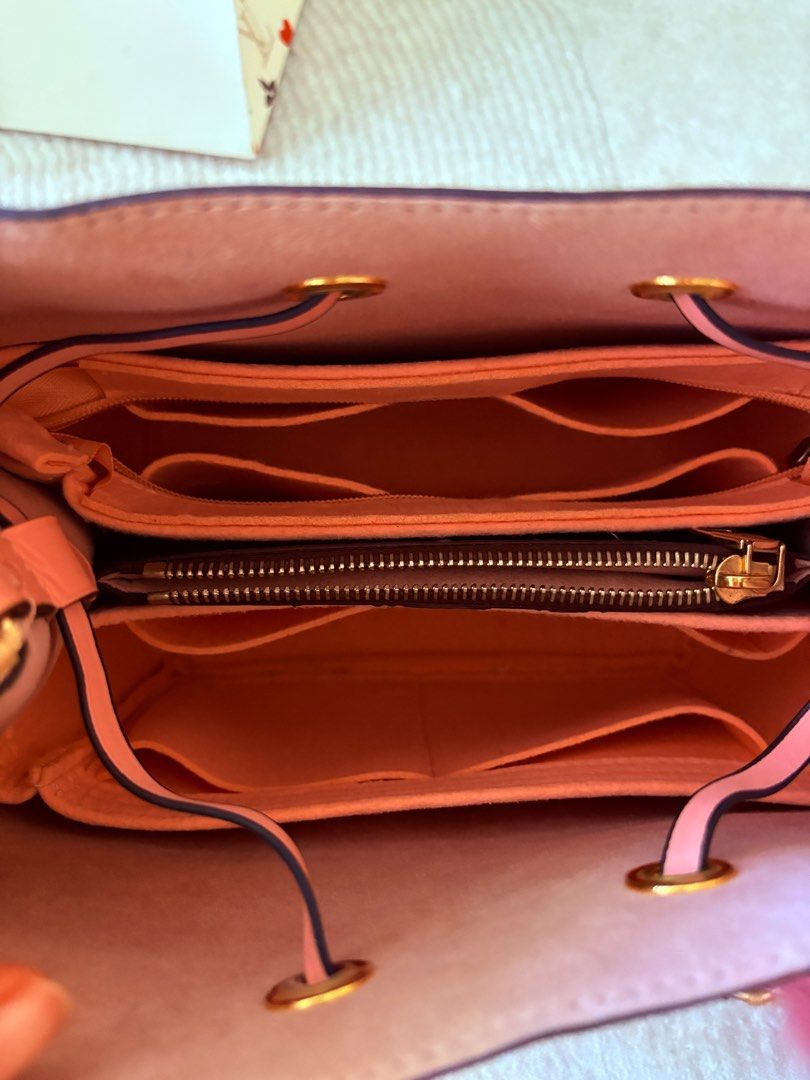 Louis Vuitton NeoNoe MM pink (Category: Bags & Wallets) located in Singapore. Submitted by BrightAdvice (Listing ID 1375113273, Image 3). Description: Comes with box, dust bag, paper bag, extra 1 strap, custom internal compartment. Used 2x only. Always kept in the dust bag and box. Bought from MBS. Slight nego ok. .