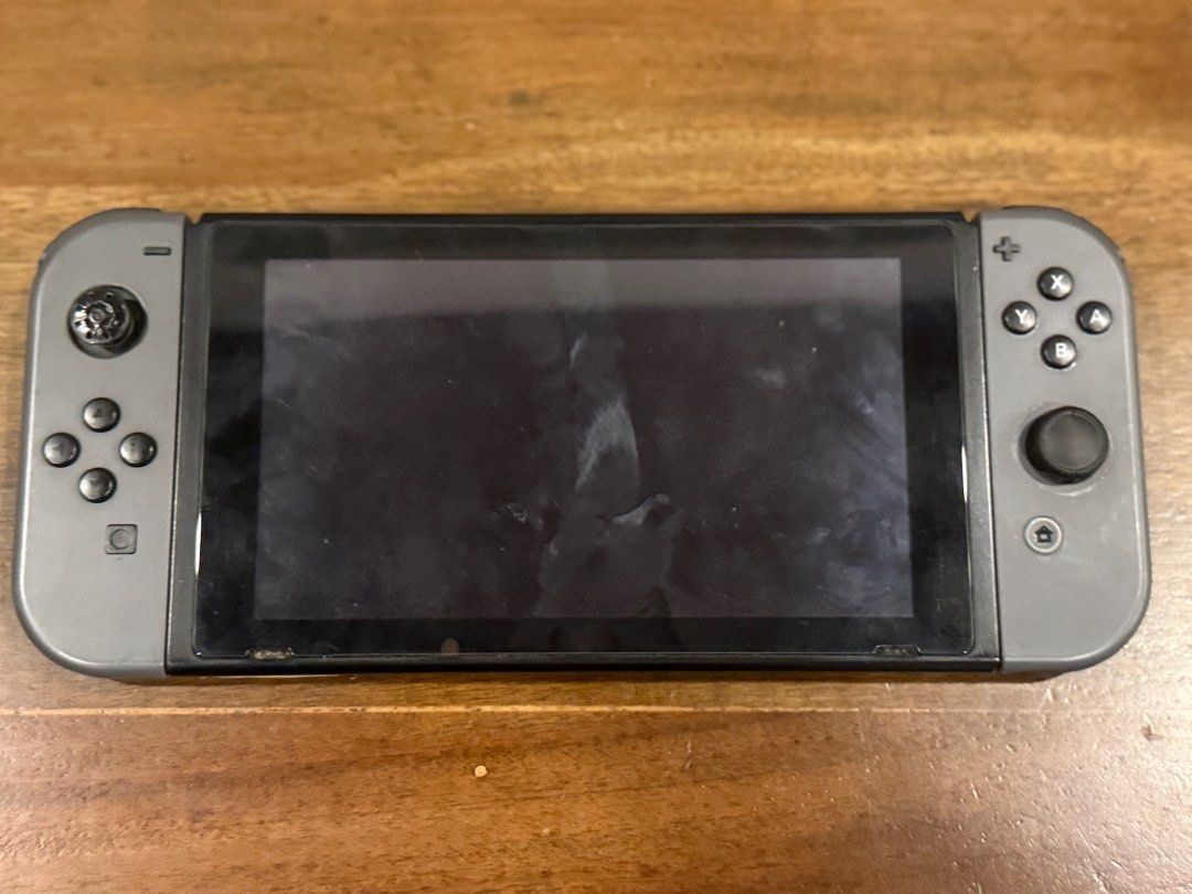 Nintendo Switch V1 Grey (Category: Nintendo) located in Taguig. Submitted by stan.ph (Listing ID 1375216143, Image 1). Description: RFS - Upgrade to Nintendo Switch 2 Nintendo Switch V1 * Fully working with minor issues * In almost good condition * Can’t be jailbreaked * No SD card * No games, console only Includes: * Console with Grey Joy-Cons * Joy-Con Straps * Joy-Con Grip * Nintendo Switch Dock with AC Adapter and HDMI Cable * HORI Case (can 